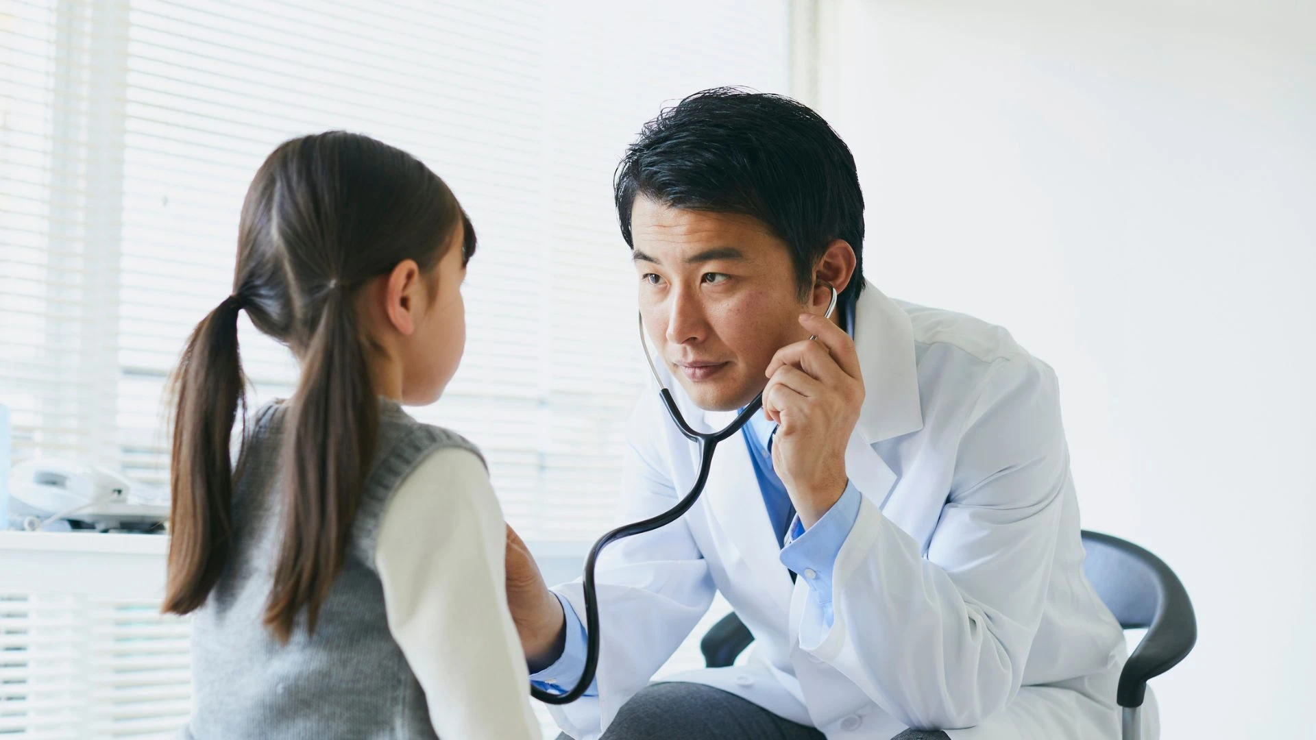 Family doctor with a child